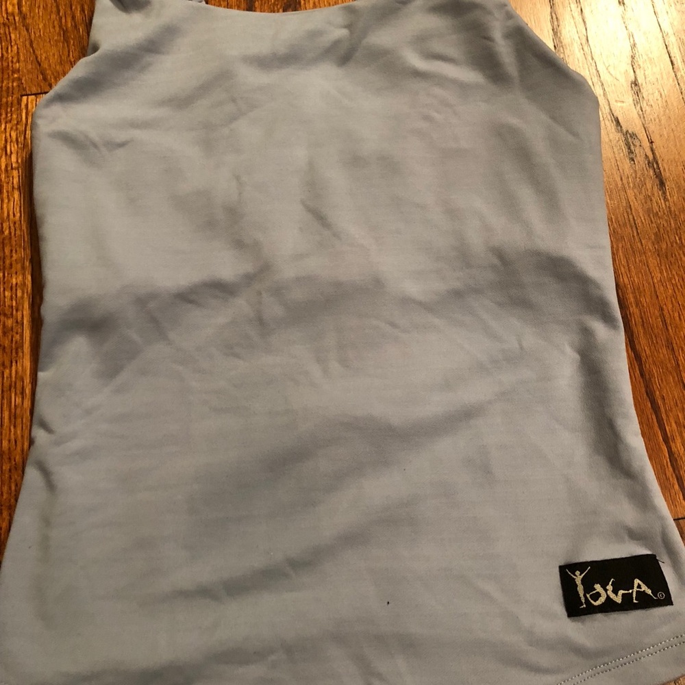 NWOT. Light Blue Backless Yoga Top. Size Medium